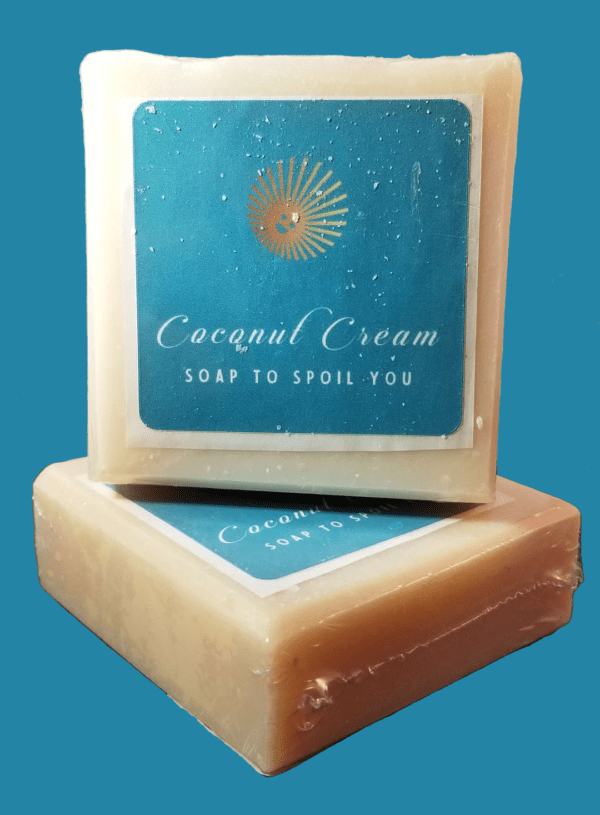 two bars of classic coconut soap on a blue background