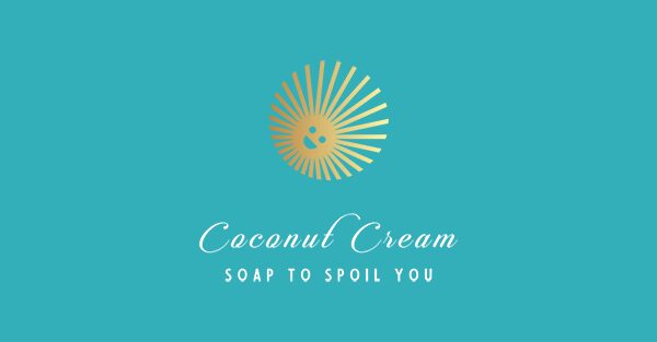 Coconut Cream Soap's logo of a golden, smiling sun sits on a tropical blue background. Underneath are the words, "Coconut Cream Soap to Spoil You".